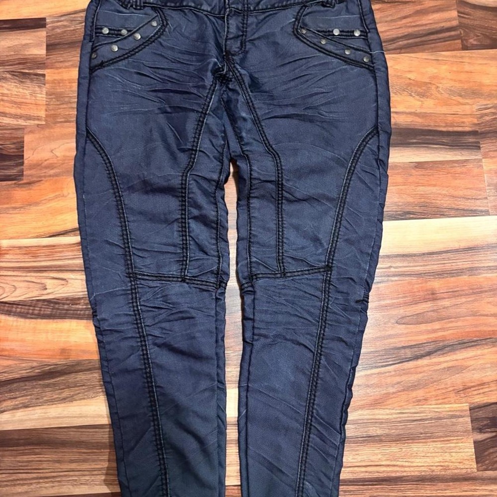 Navy blue Vip jeans denim with black stitching and silver studs